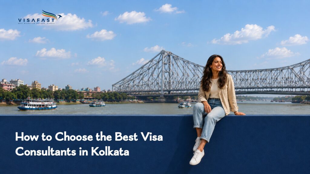 Woman sitting by the Hooghly River with Howrah Bridge in Kolkata